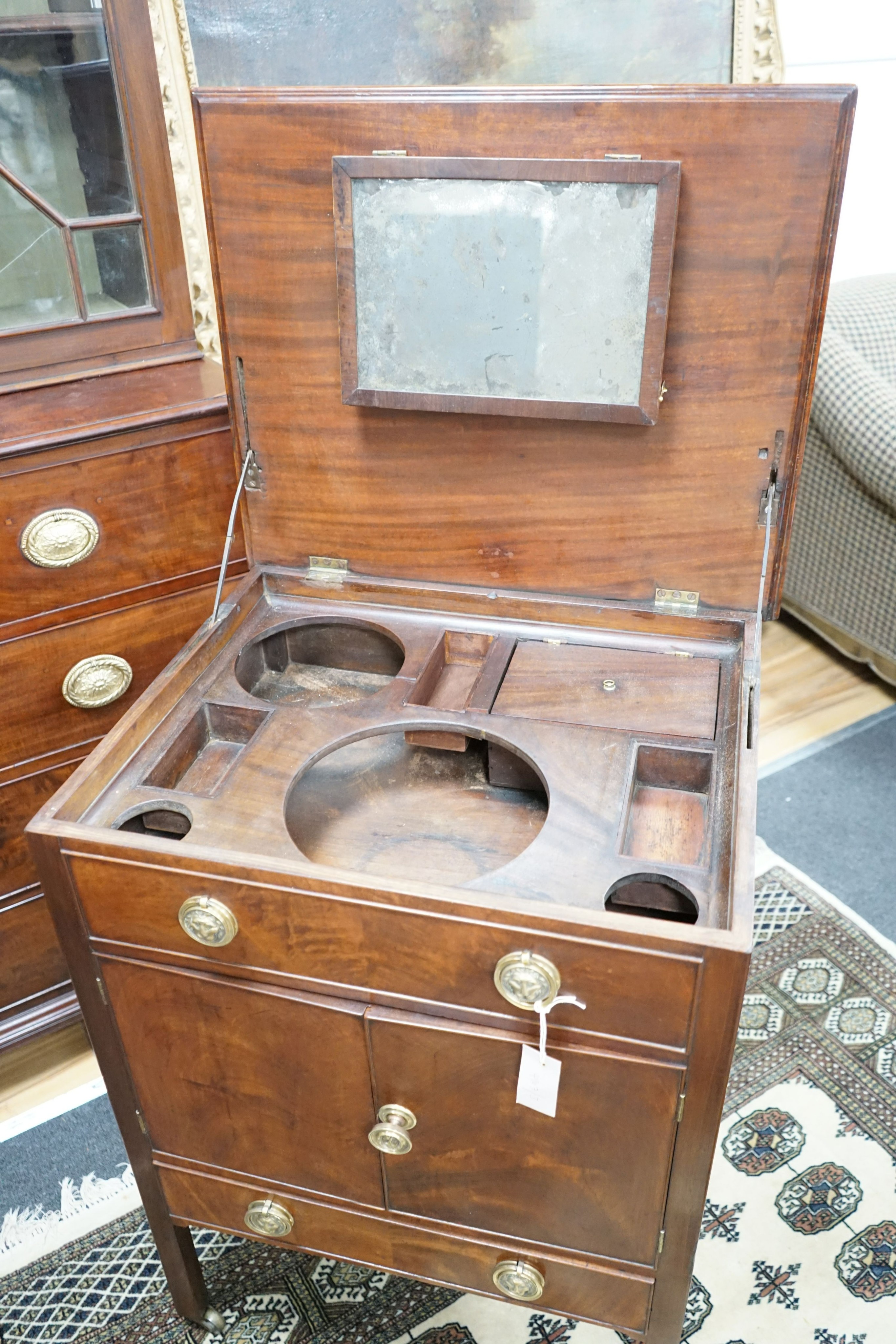 A George III mahogany enclosed washstand, width 64cm, depth 53cm, height 87cm